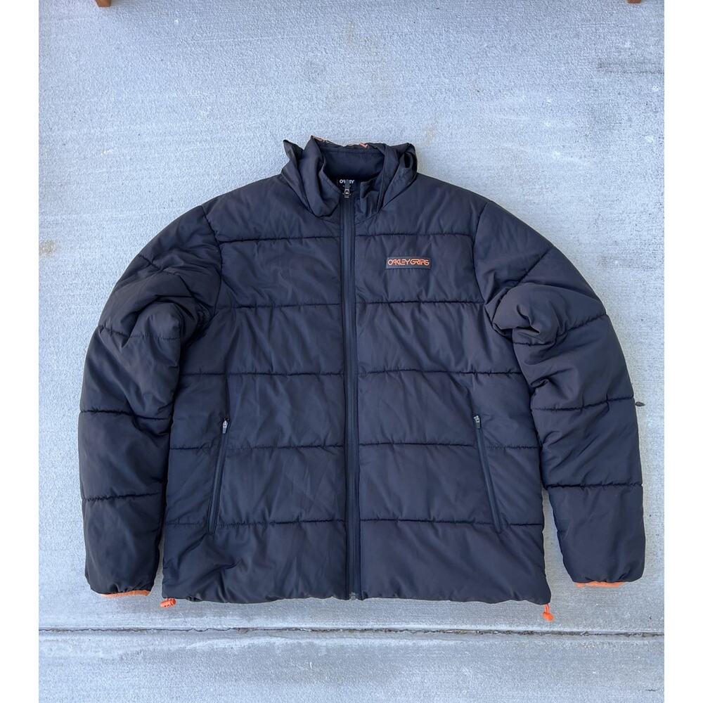 Oakley Grips Puffer Hidden Hood Jacket Black Orange Men’s XL O-Grip Regular Fit